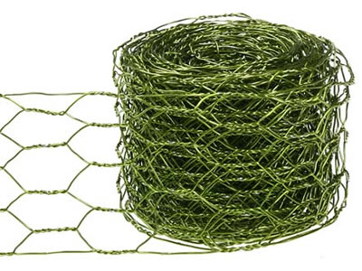 A roll of apple green reverse twist unilateral PVC coated hexagonal wire mesh.