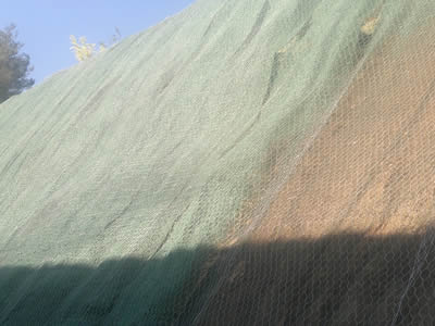 Hexagonal wire mesh is applied upon coir fiber netting.