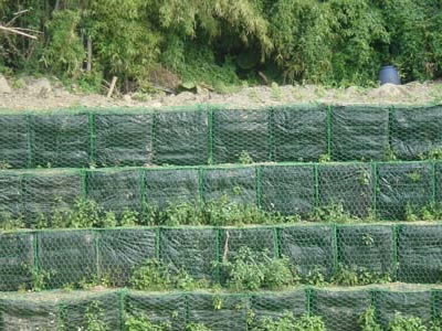 Four levels of green gabion basket is fixed together.