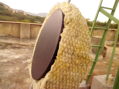 This is a solar energy receiver wrapped with rock wool blanket.